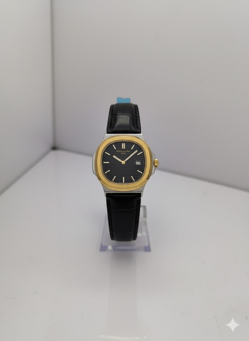 The Patek Philippe Nautilus: Gold & Steel with Black Leather Strap