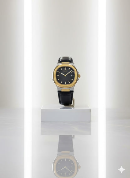 The Patek Philippe Nautilus: Gold & Steel with Black Leather Strap